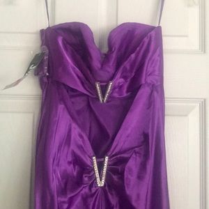 Never worn strapless purple gown